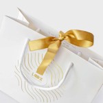 Bolsa de papel personalizada con asa de cordón