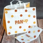 Bolsa de papel con asa personalizada con logo