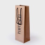 Bolsa de papel con asas de cordón para botella de vino