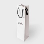 Bolsa de papel con asas de cordón para botella de vino